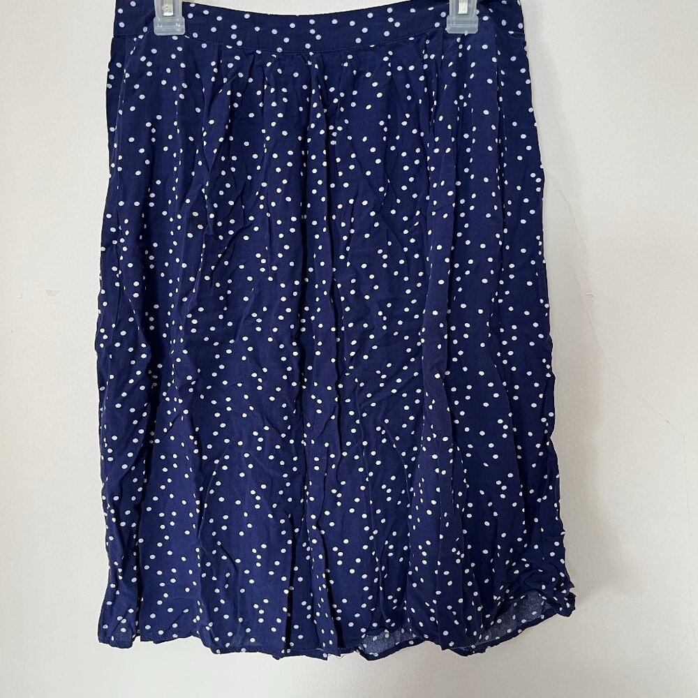 Polka dot skirt with elastic waist and zipper on the hip